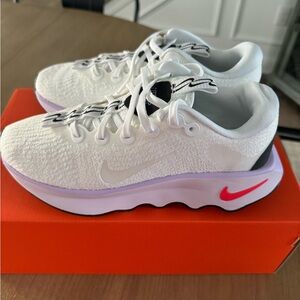Woman’s Nike Motiva sneakers.